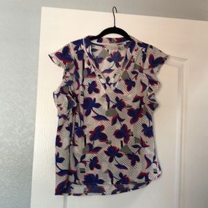 Floral top with short flutter sleeves. Size small.